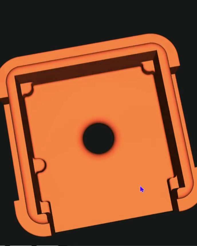 Modelo 3D naranja de la tapa de un módulo de cámara, visto en el programa de diseño